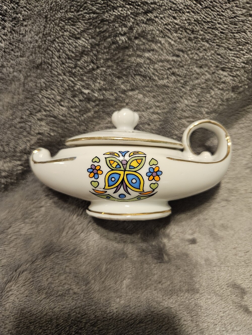 Vintage genie lamp-shaped incense burner.